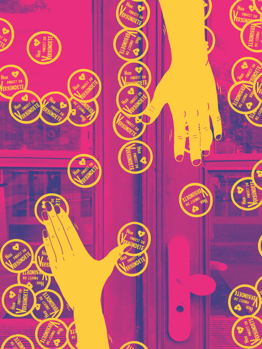 Bright pink and yellow image of hands reaching towards a glass door covered in circular stickers. The stickers feature text and heart symbols. The background glass reflects outdoor greenery.